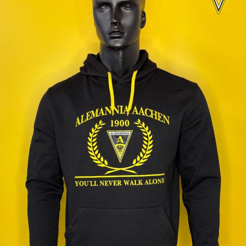 Black hoodie on a mannequin with yellow Alemannia Aachen crest and text ('1900' and 'YOU'LL NEVER WALK ALONE') on the front against a yellow background; yellow drawstrings visible.