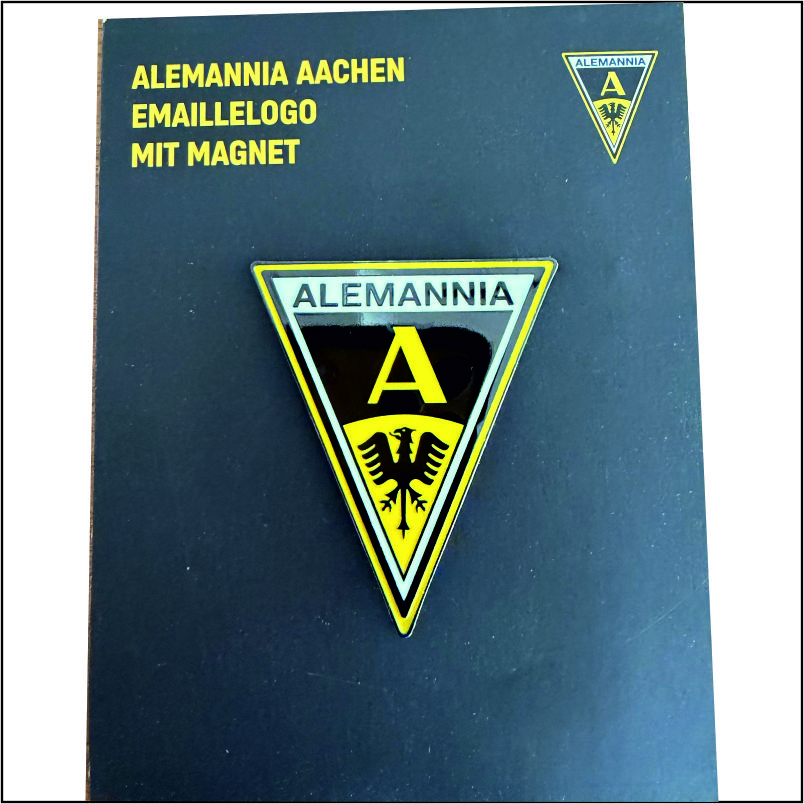 Alemannia Aachen enamel badge with magnet, triangular shield design on a dark surface