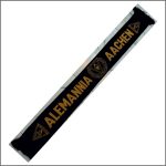 Long black scarf with gold lettering and crests, displayed diagonally across a white background.