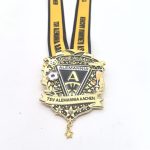 Gold and black medal for TSV Alemannia Aachen with crest, soccer ball, laurel motifs, and a yellow ribbon reading Alemannia Aachen hanging below