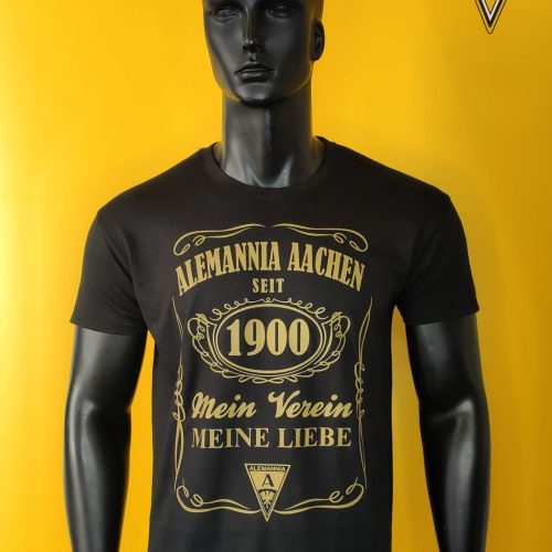 Black T-shirt on a gray mannequin against a bright yellow background; shirt reads 'ALEMANNNIA ACHEN SEIT 1900 Mein Verein Meine Liebe' with emblem.