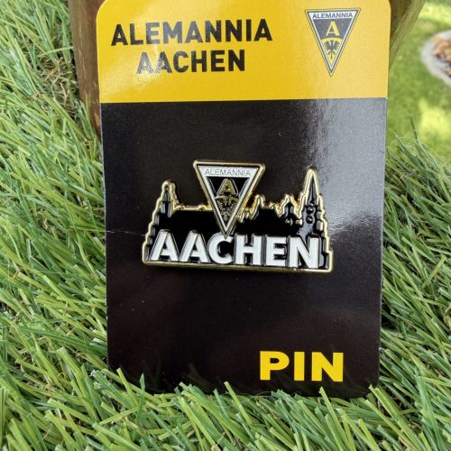 IMG_9298 - Alemannia Shop Enamel pin with Alemannia Aachen crest on a yellow-and-black card